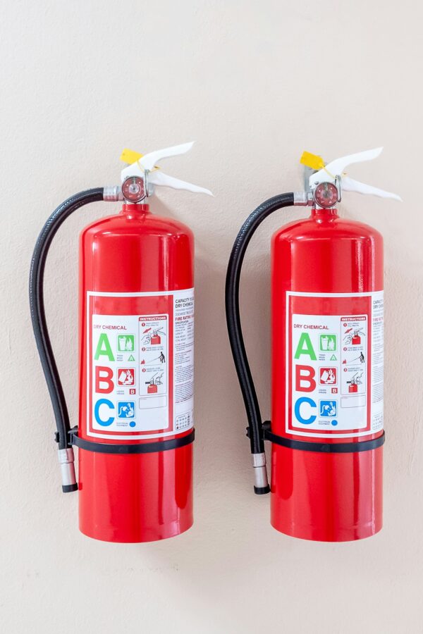 Fire extinguisher system on the wall background,